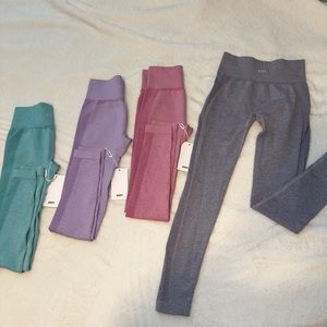 3 pairs of KEFI leggings - brand new. Size SM
